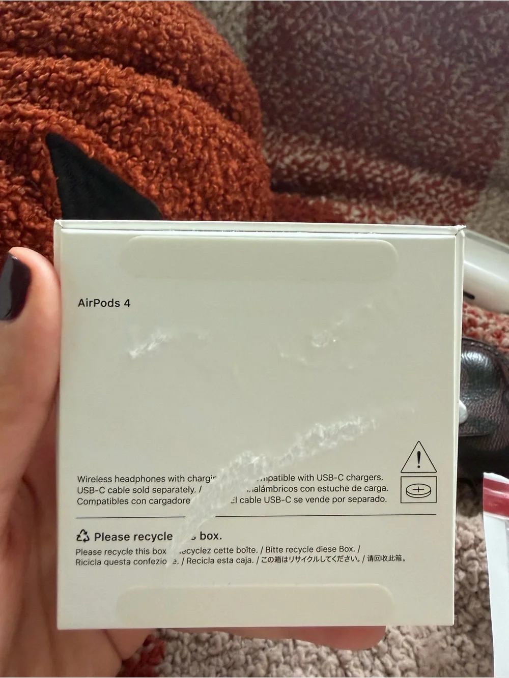 Apple AirPods 4 with two protective cases bundle